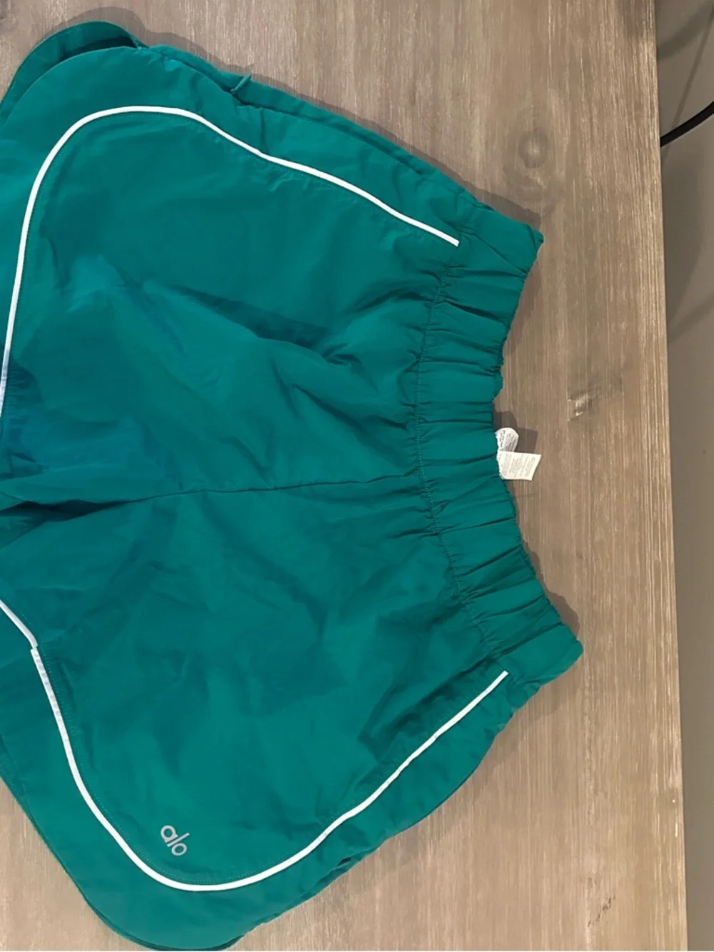 ALO Yoga Motivate Track Short Athletic Shorts Spruce Green/White Piping Small